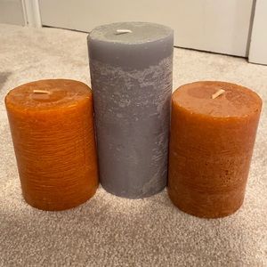 One green and two orange candles